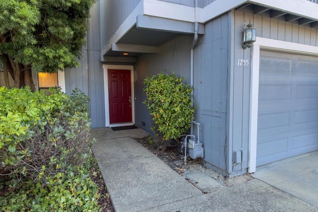 property entrance with a garage