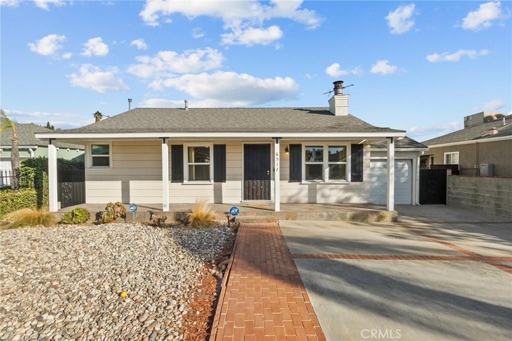 ranch-style house featuring a garage