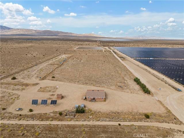 drone / aerial view with a water and mountain view