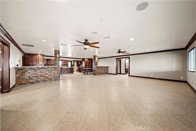 tiled living room featuring ornamental molding and ceiling fan