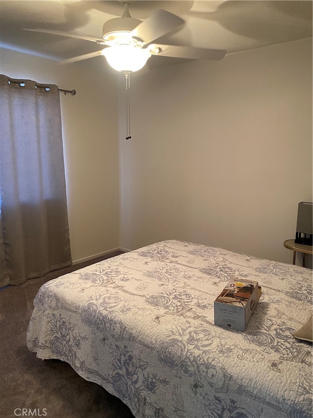 bedroom featuring carpet and ceiling fan