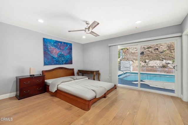 bedroom featuring access to outside, ceiling fan, and light hardwood / wood-style floors