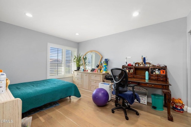 bedroom featuring light hardwood / wood-style flooring