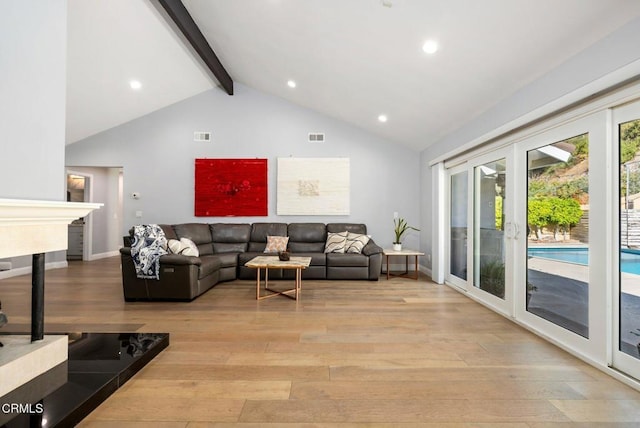 living room with french doors, light hardwood / wood-style floors, high vaulted ceiling, and beam ceiling