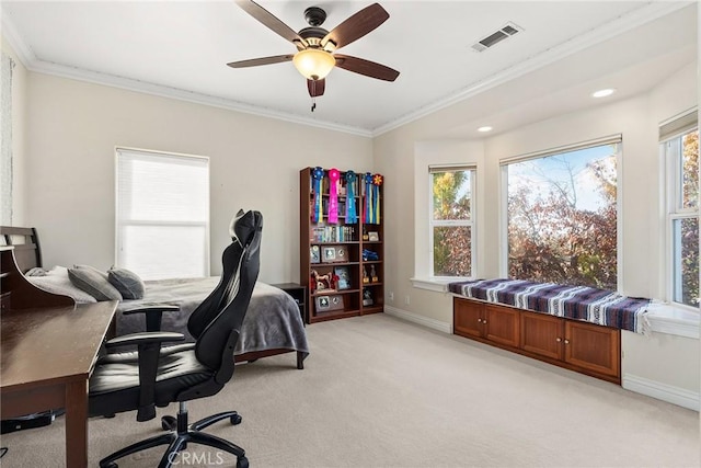 carpeted office with ceiling fan and crown molding