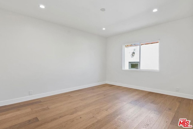 empty room featuring light hardwood / wood-style floors