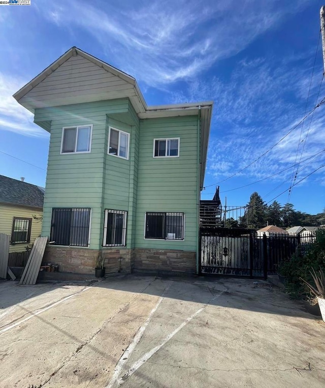 rear view of house with a patio area