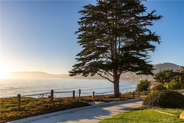 view of home's community featuring a water view