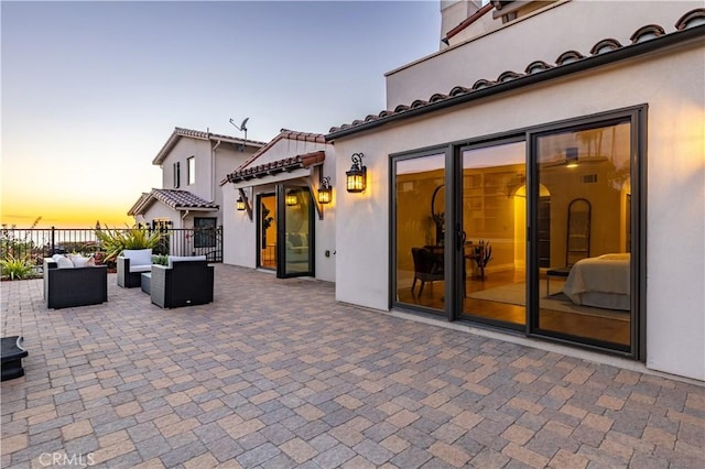 view of patio / terrace with outdoor lounge area and fence