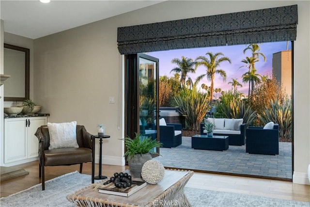 interior space featuring an outdoor kitchen and an outdoor living space