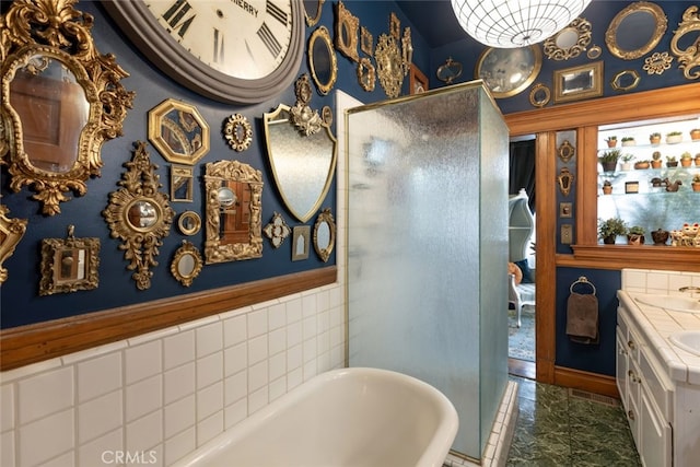 bathroom featuring vanity and plus walk in shower