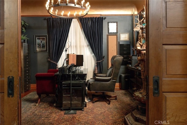 living area with a chandelier and dark carpet