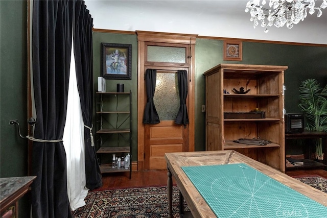 interior space with hardwood / wood-style flooring and a notable chandelier