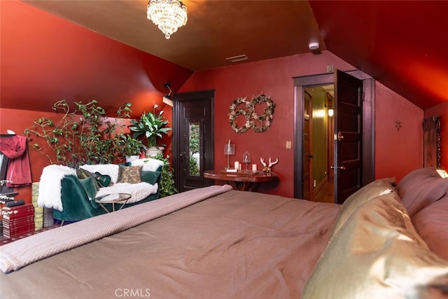 bedroom featuring vaulted ceiling