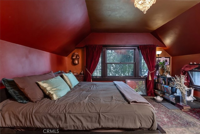 bedroom with vaulted ceiling