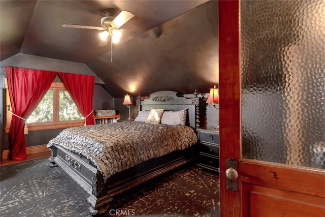 bedroom with ceiling fan and vaulted ceiling