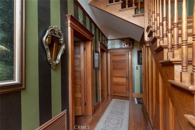 hallway featuring hardwood / wood-style flooring