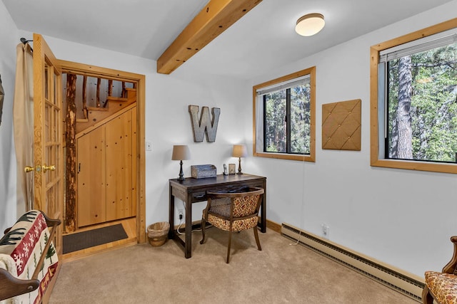 office area featuring baseboard heating, beamed ceiling, carpet flooring, and plenty of natural light