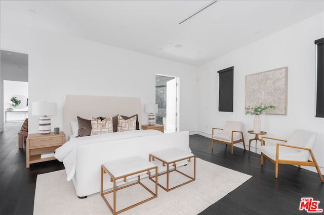 bedroom featuring dark hardwood / wood-style floors