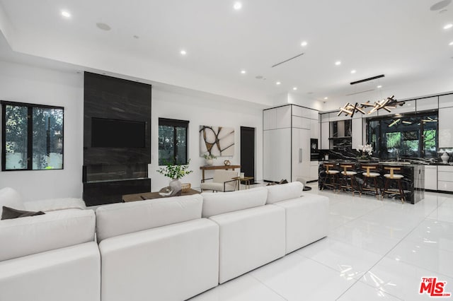 tiled living room featuring plenty of natural light