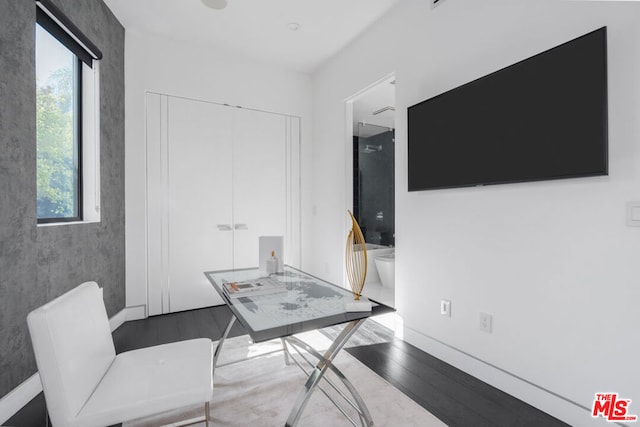 office space with a healthy amount of sunlight and wood-type flooring