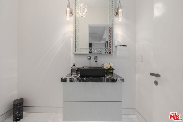 bathroom featuring vanity and tile patterned flooring