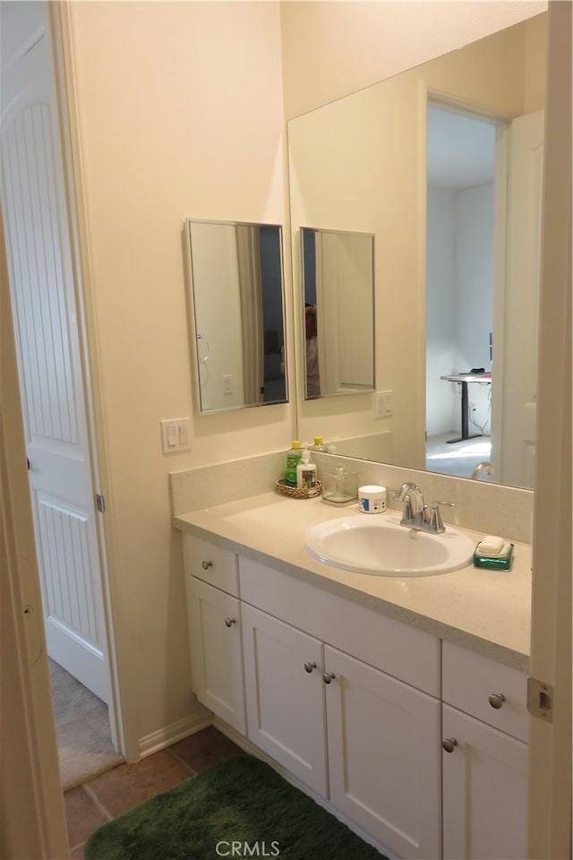 bathroom featuring vanity and tile patterned flooring