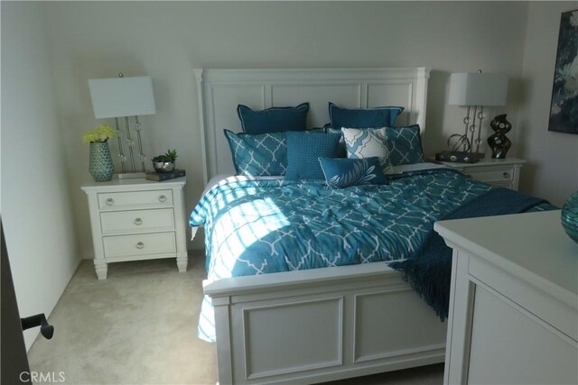 24819 Onyx Dr, Menifee, CA 92585 - bedroom featuring light colored carpet
