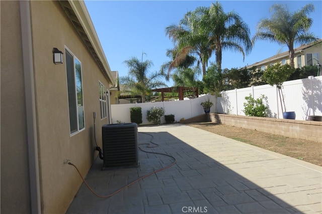 view of patio featuring cooling unit