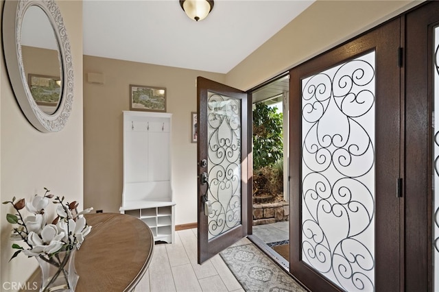 foyer with light hardwood / wood-style floors