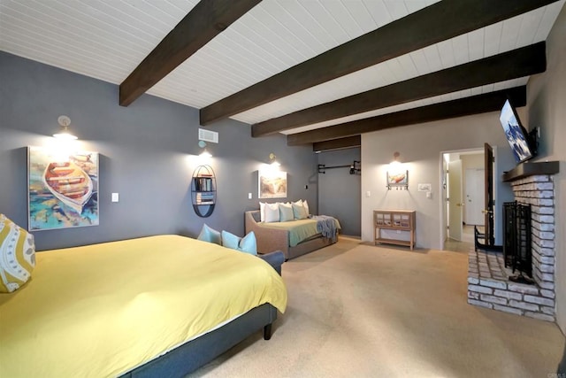 carpeted bedroom with beamed ceiling and a fireplace