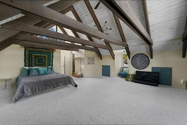 carpeted bedroom with high vaulted ceiling and beamed ceiling