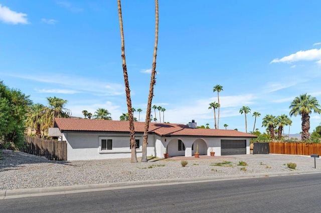 ranch-style home with a garage