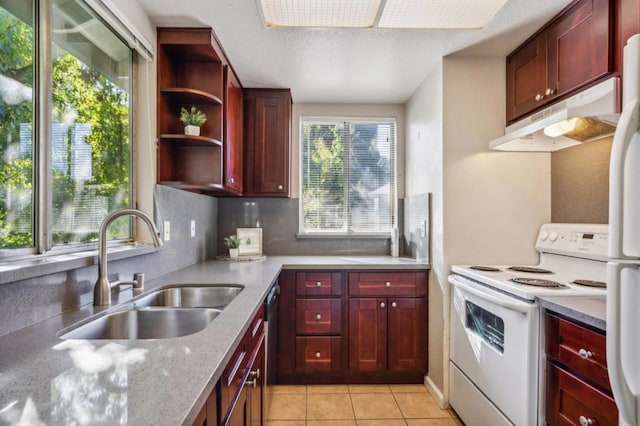 kitchen featuring sink, light tile patterned floors, white appliances, light stone countertops, and decorative backsplash