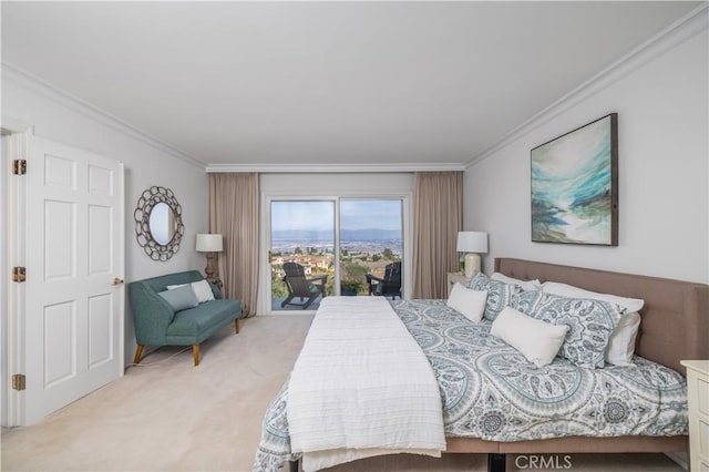 carpeted bedroom featuring crown molding and access to exterior