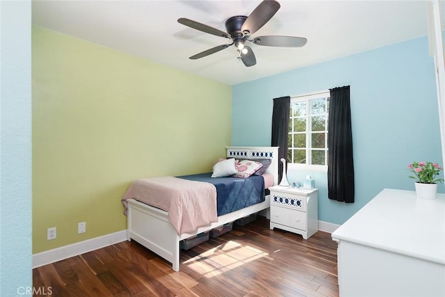 bedroom featuring ceiling fan and dark hardwood / wood-style floors