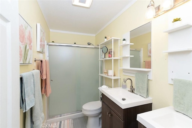 bathroom featuring vanity, an enclosed shower, and crown molding