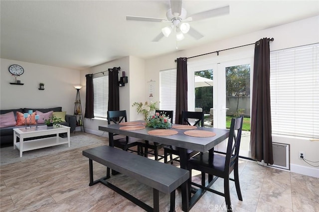 dining space featuring ceiling fan