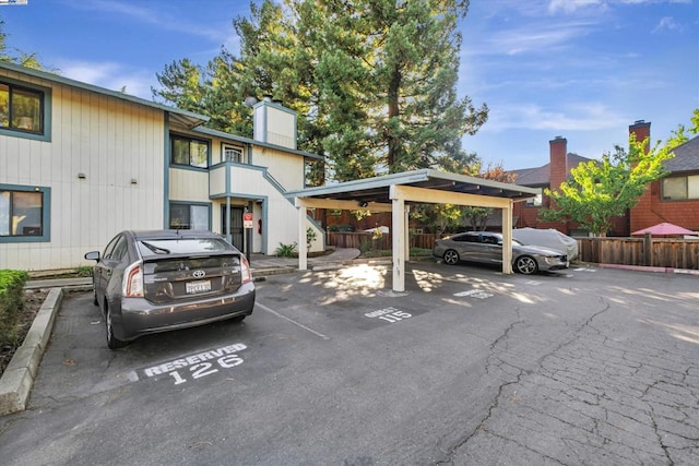 view of parking with a carport