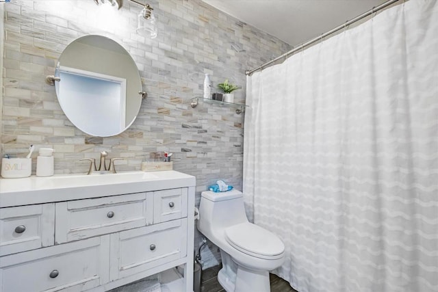 bathroom with decorative backsplash and tile walls