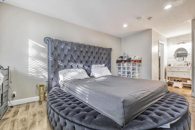 bedroom featuring light wood-type flooring