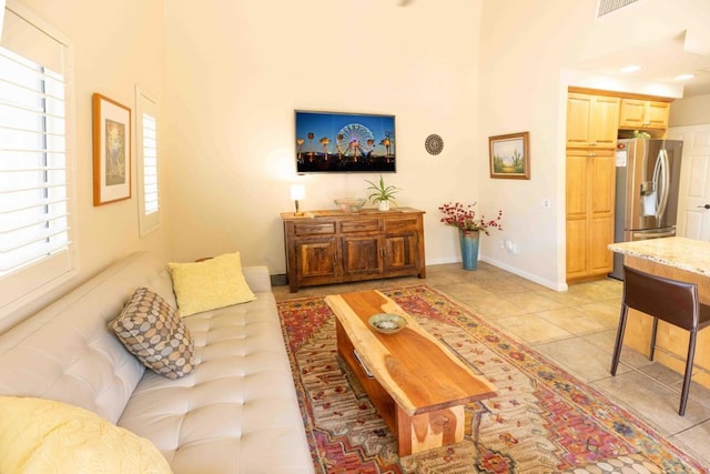 living room with light tile patterned floors