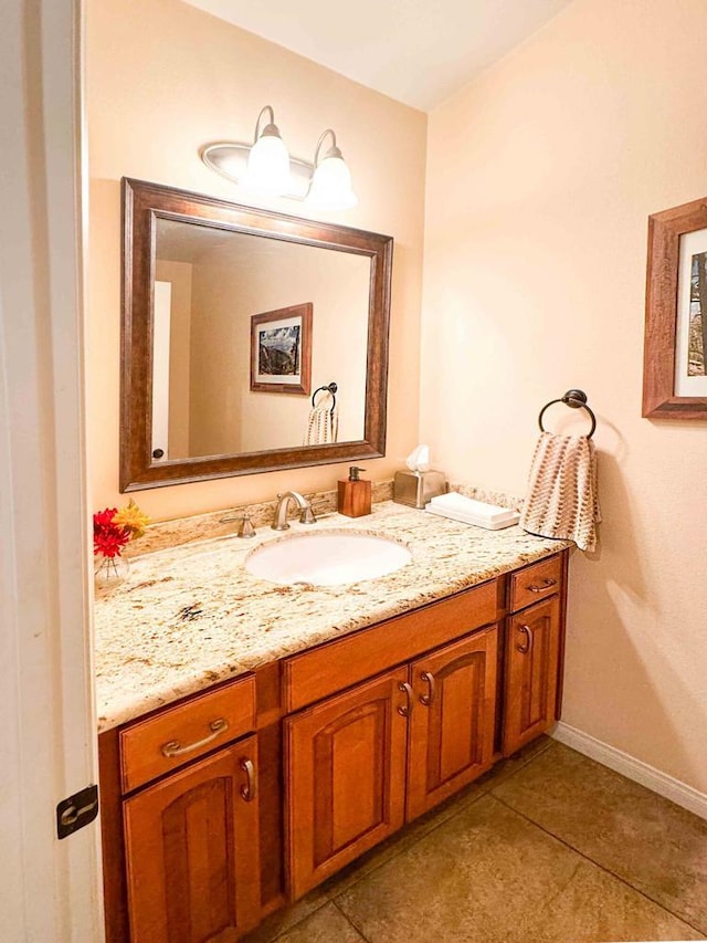 bathroom featuring tile patterned floors and vanity