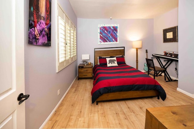 bedroom with wood-type flooring