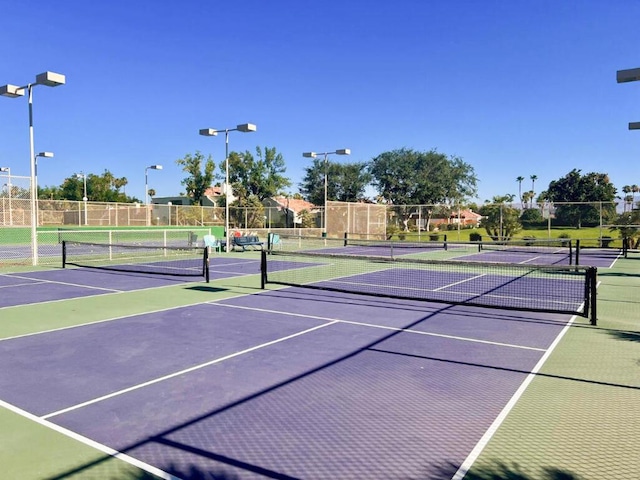 view of sport court featuring basketball hoop