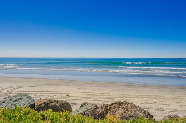 water view featuring a beach view