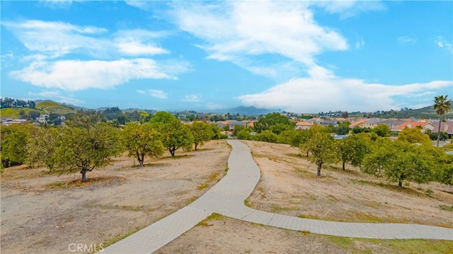 surrounding community featuring a mountain view