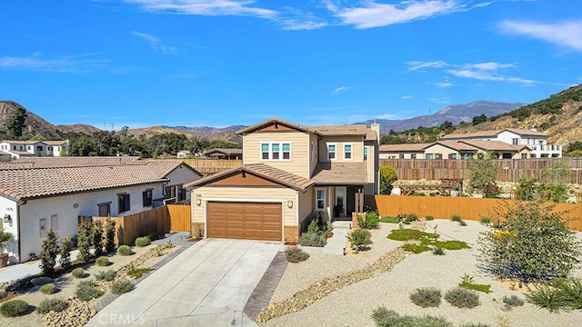 view of front of property with a mountain view