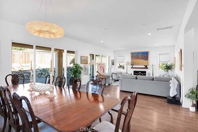 dining area with wood-type flooring