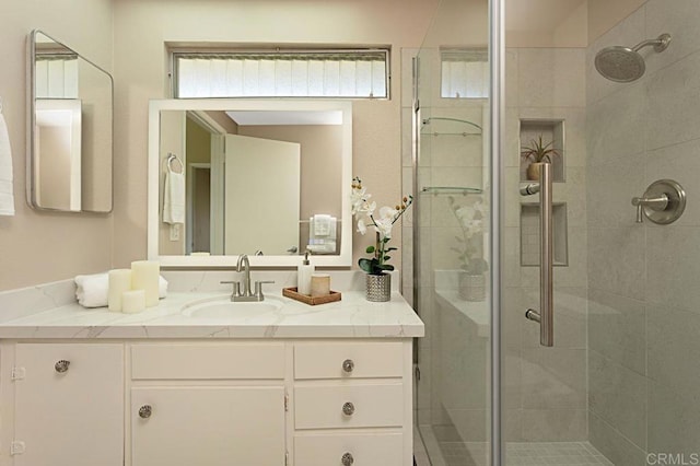 bathroom featuring vanity and walk in shower